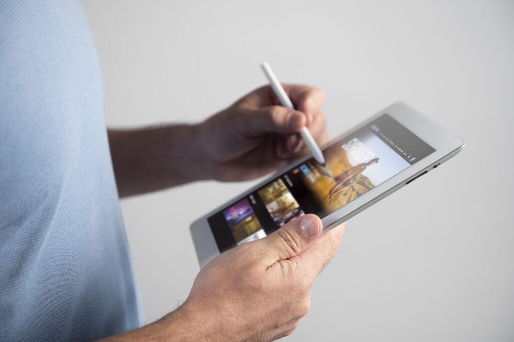 man using digital assistant his tablet scaled