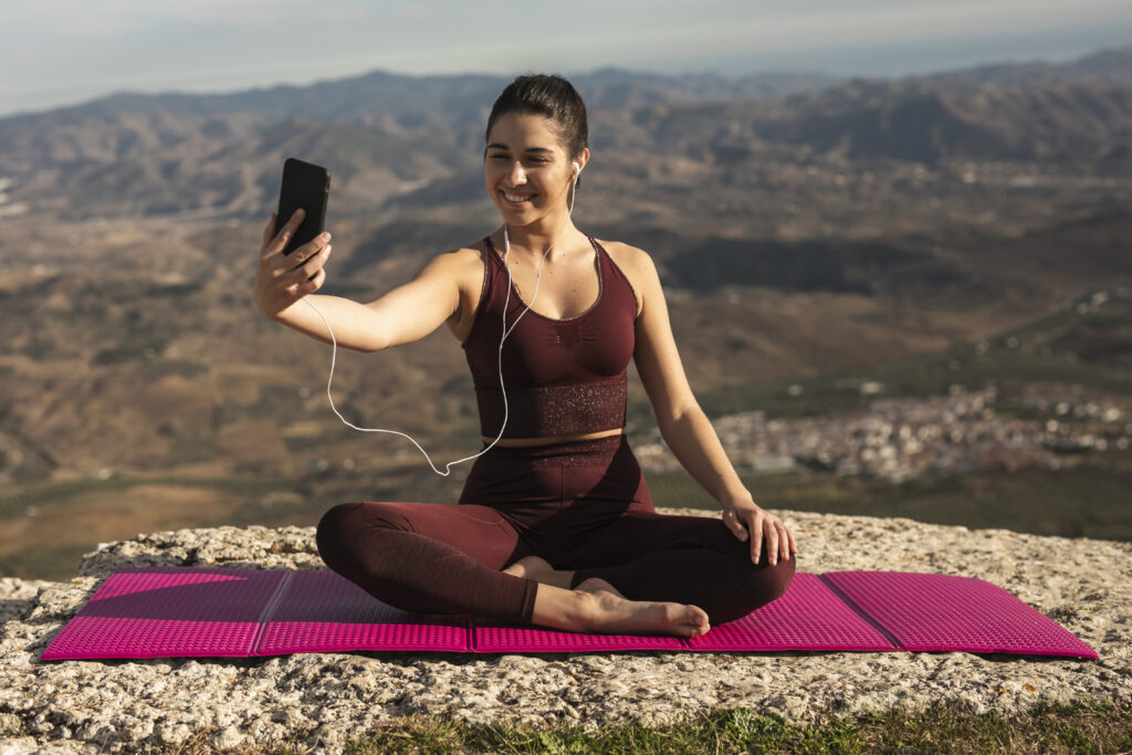 young woman doing yoga mountain mock up