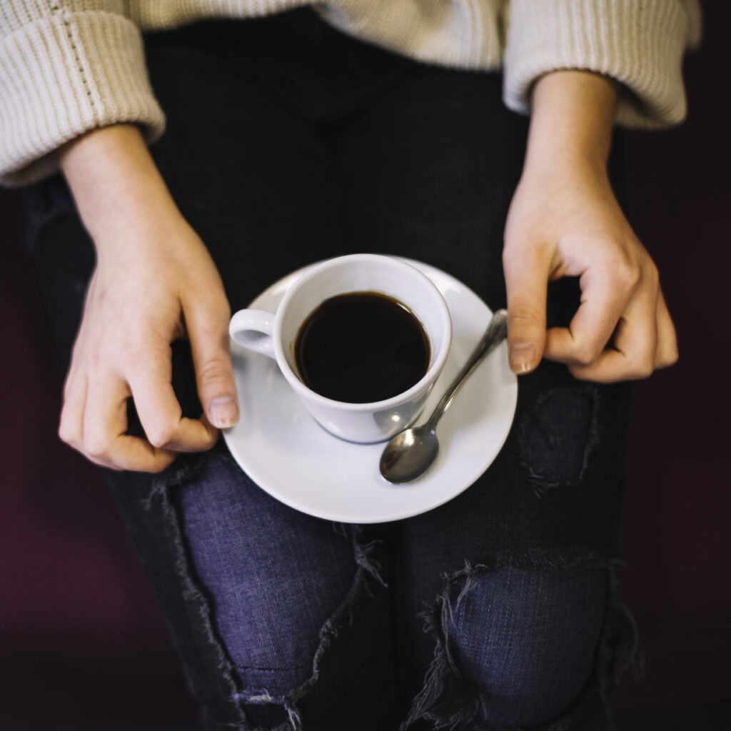 woman with cup drink plate